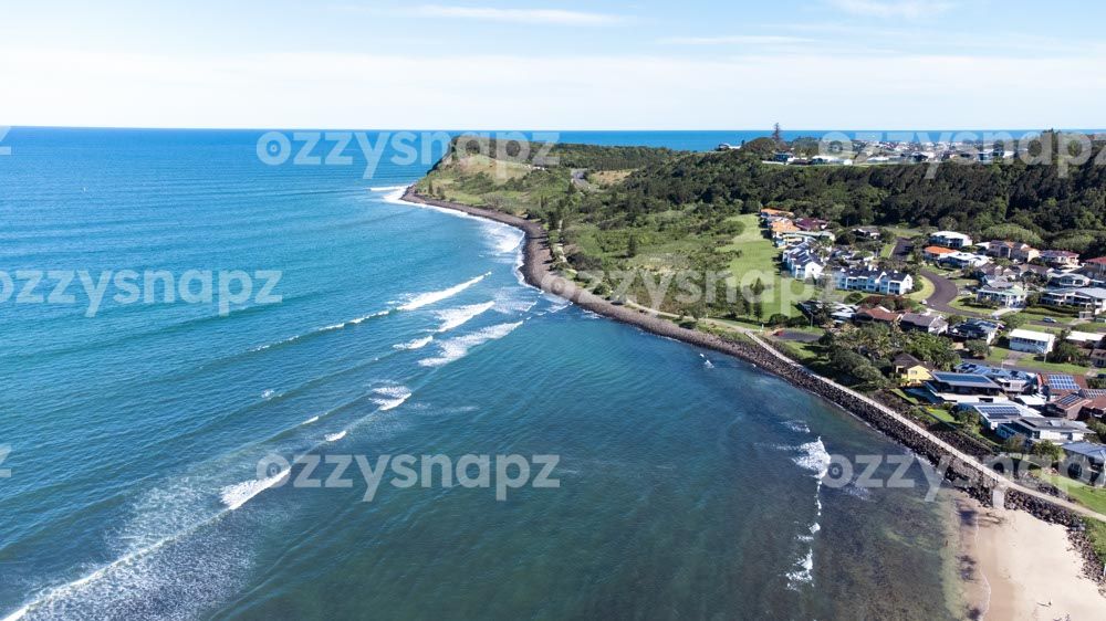 Pat Morton Lookout aerial view from Seven Mile Beach Wonderful aerial view of the homes in Lennox Head, the clear waters of the Pacific Ocean, the Pat Morton Lookout and the Lennox Head Point walking path.