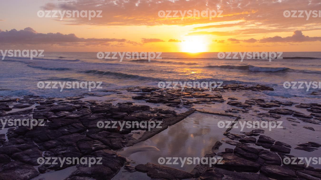 ozzysnapz_221295_low Stunning drone photography capturing the sunrise over the picturesque Shelly Beach rockpool