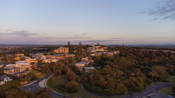 Stock image of East Ballina's Shelly Beach Road and Suvla St houses at Sunrise