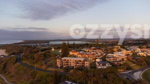 Stock image captured during sunrise over the East Ballina Beachfront and Ballina Lighthouse with Richmond River in the background.