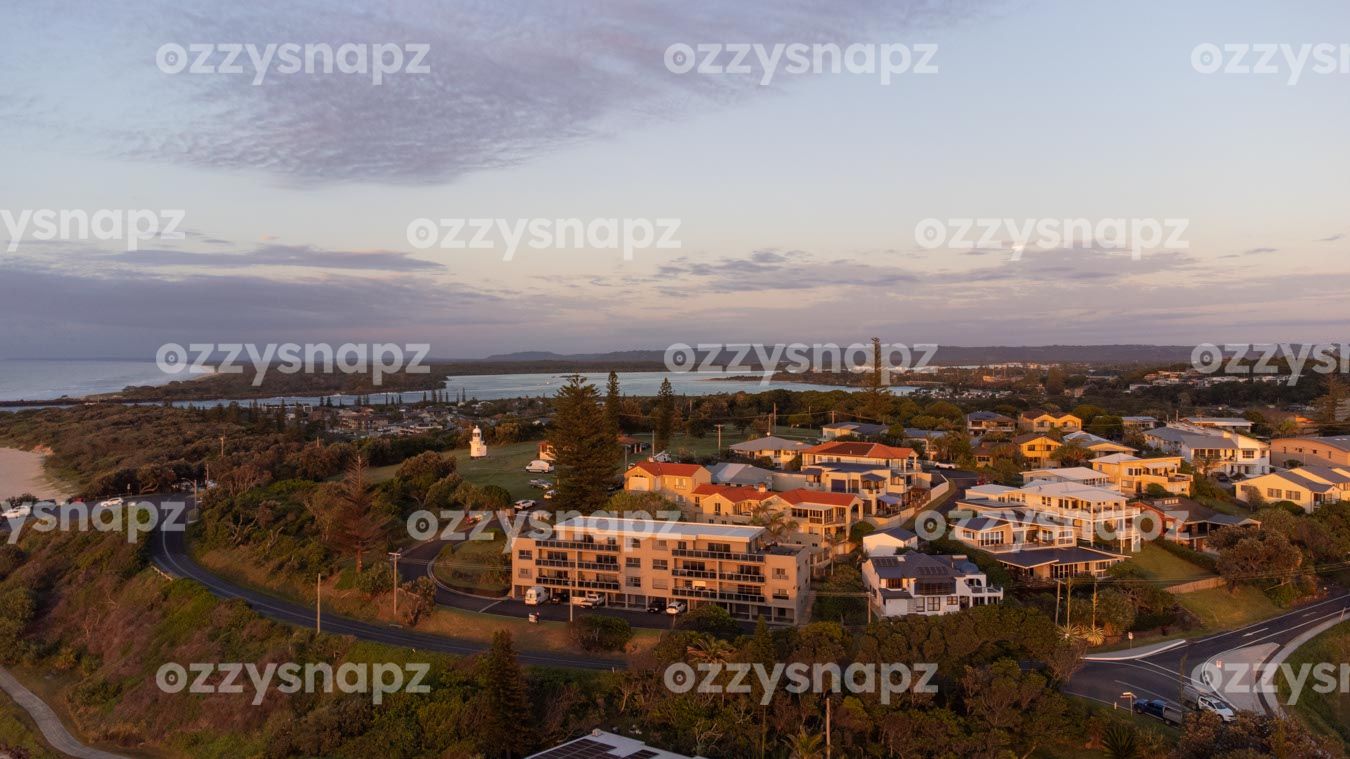 ozzysnapz_221300_low Stock image captured during sunrise over the East Ballina Beachfront and Ballina Lighthouse with Richmond River in the background.