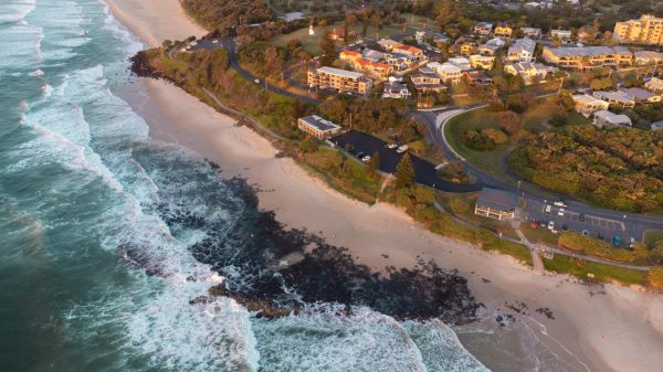 Bird's eye view of Shelly Beach in East Ballina with this stunning aerial shot during sunrise.