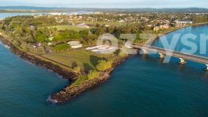 Stunning drone shot of Missingham Park in Ballina at sunrise. North Creek, Richmond River, and lush greenery in a high-quality stock image.
