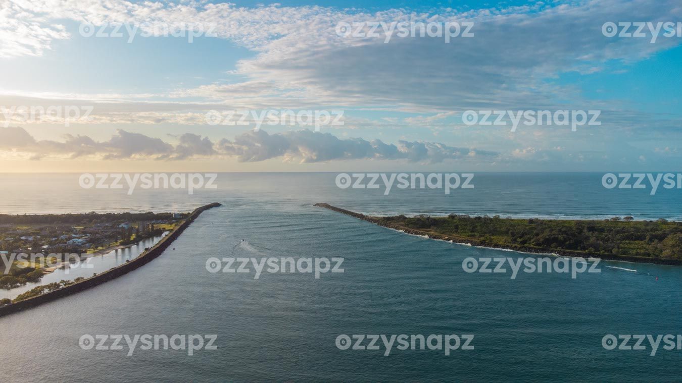 ozzysnapz_221318_low Aerial view stock image of the sunrise at Richmond River's Mouth in Ballina.