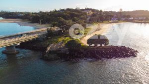 Stunning aerial shot of Gawandii Beach, Missingham Bridge, and North Creek beach during sunrise.