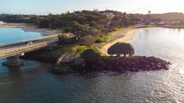 Stunning aerial shot of Gawandii Beach, Missingham Bridge, and North Creek beach during sunrise.
