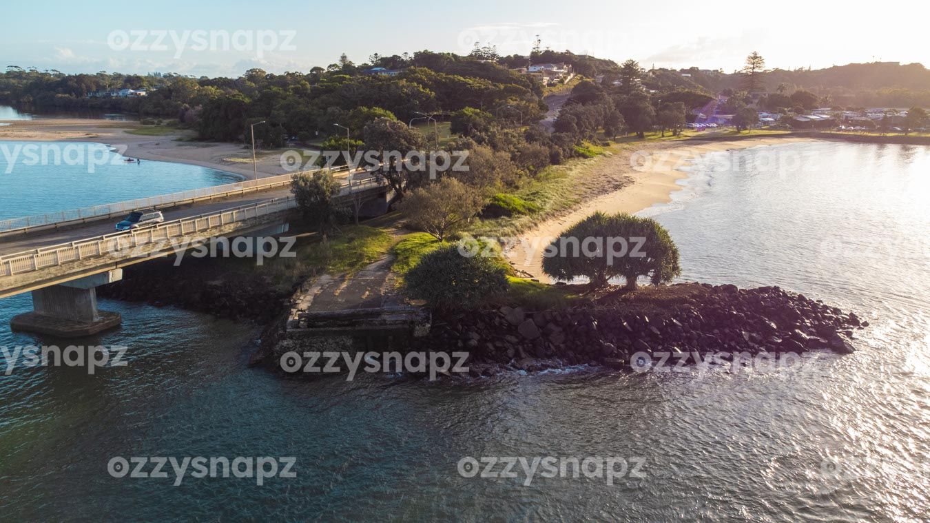 ozzysnapz_221330_low Stunning aerial shot of Gawandii Beach, Missingham Bridge, and North Creek beach during sunrise.