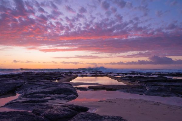 Stock photo of a peaceful morning at Shelly Beach Rock Pool in East Ballina.