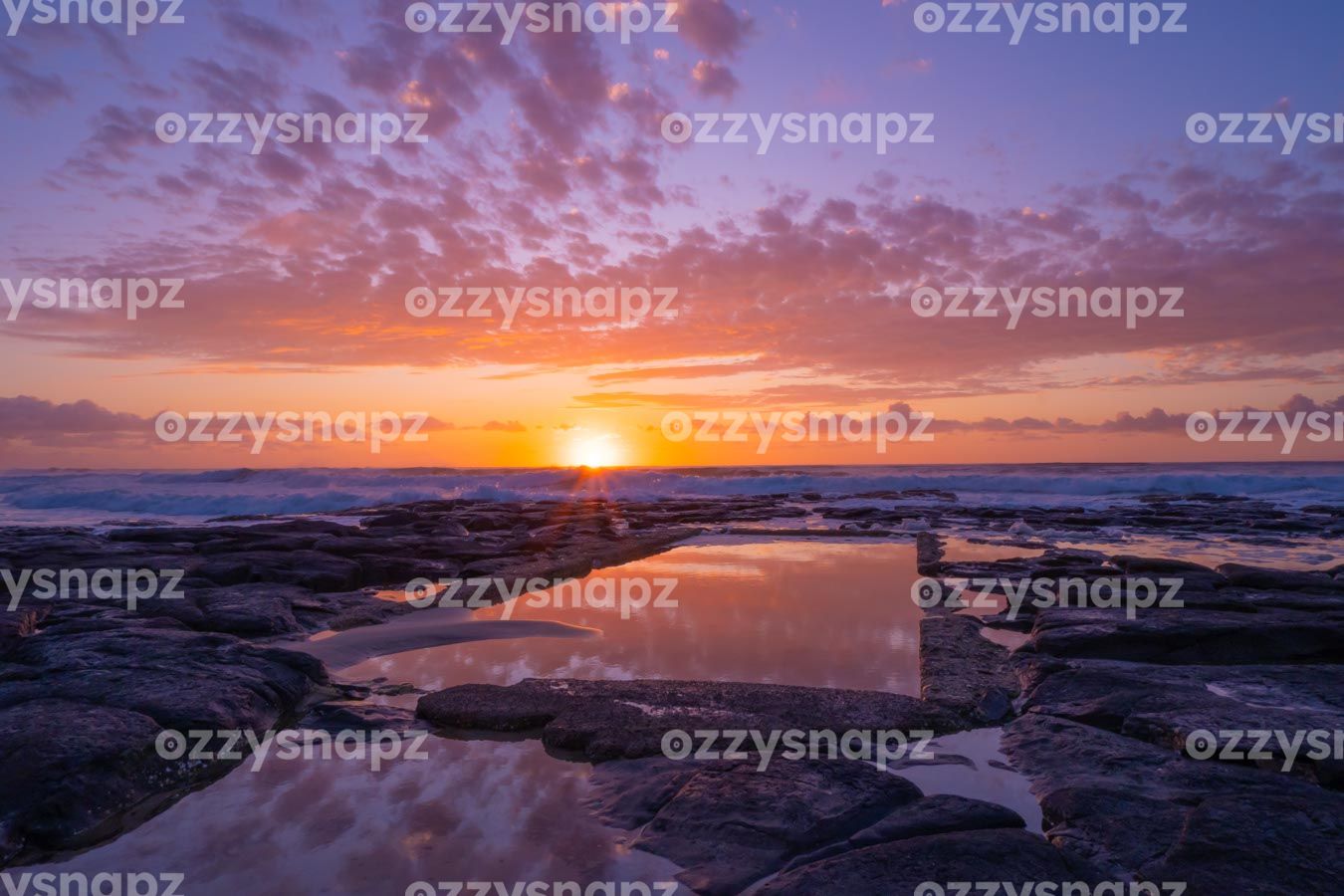 ozzysnapz_221340_low Stunning stock photo capturing the sunrise over the sea at Shelly Beach Rock pool in East Ballina.