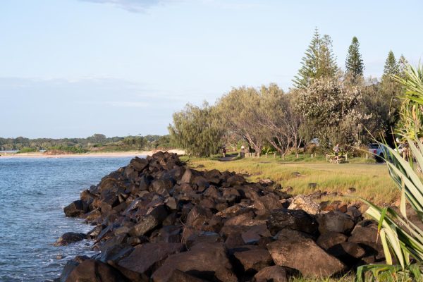 People jogging along the walking trail by the Richmond River.